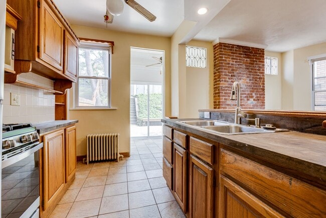 Building Photo - AVAILABLE June 2026 - Beautiful 4 Bedroom, 2 Bath Home w/ Front Porch Swing!