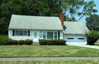 Building Photo - Newly Renovated - Spacious 4 Bedroom - 2 B...