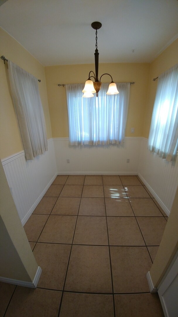 Building Photo - Gorgeous and Spacious 3-Bedroom 2-Bath home with Built-In BBQ, Garage, Hardwood Floors & Yard! MO...