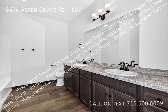 Building Photo - 8676 Aspen Ln