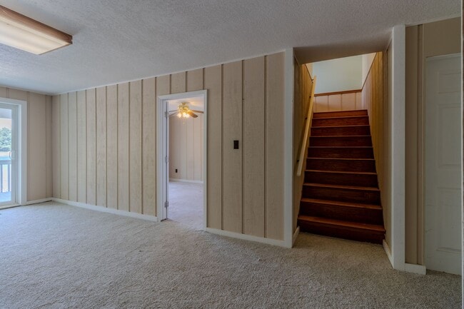 Building Photo - Price Improvement! Lakefront Dream Home – ...