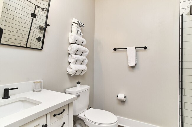 Building Photo - Fully Furnished 2BD Duplex in the Heart of...
