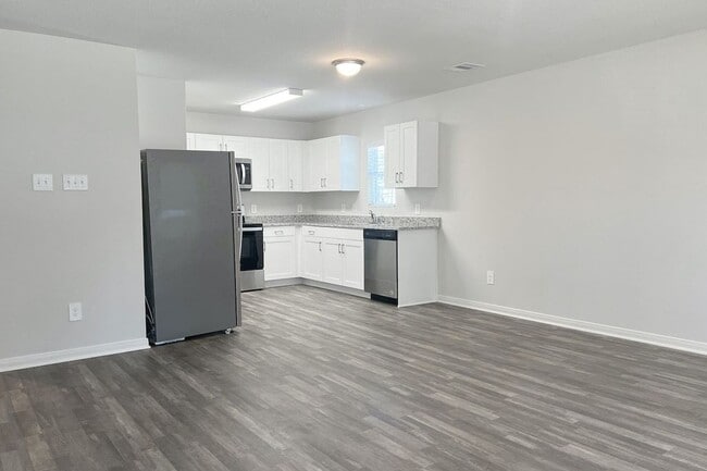 Building Photo - The home is a 1 story, 2 car garage 3 bedrooms, 2 full baths. Open floor plan from the kitchen ar...