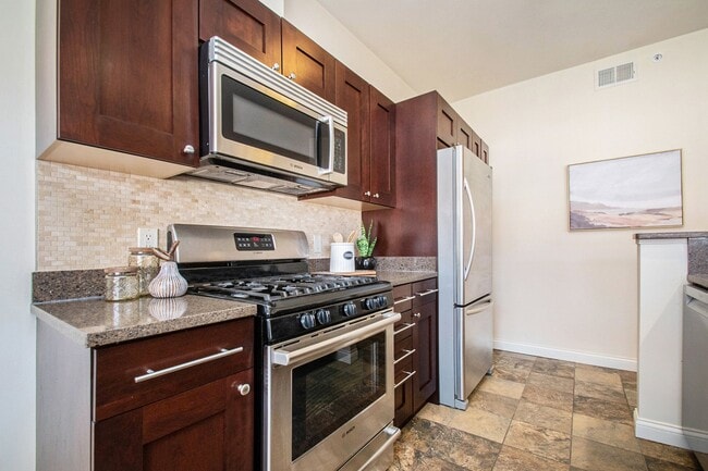 Building Photo - The Residences at Toscana Park