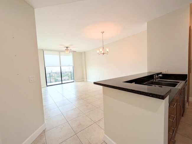 Building Photo - Modern 1BR/1BA Condo with 2 Parking Spaces – Prime Coral Gables Location
