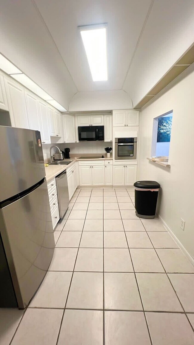 Building Photo - 19370 Collins Ave