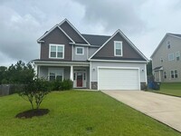 Building Photo - Spacious 4-Bedroom Home with Designer Fini...