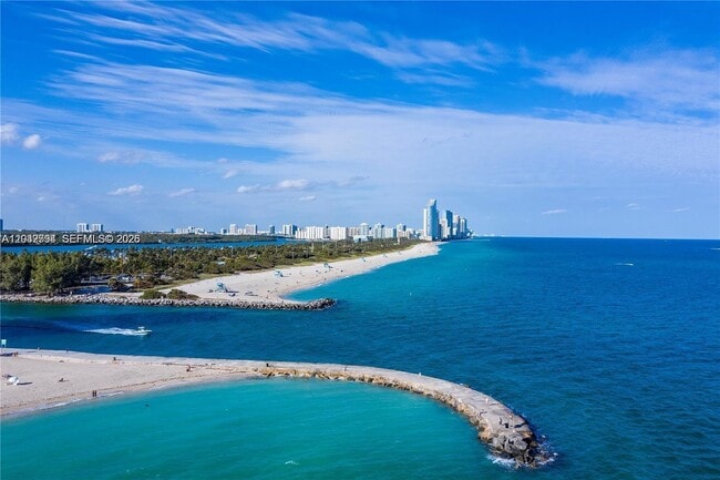 Building Photo - 10275 Collins Ave