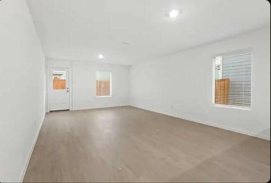 View from kitchen looking into living room area - 726 Sandhill Crane Ln