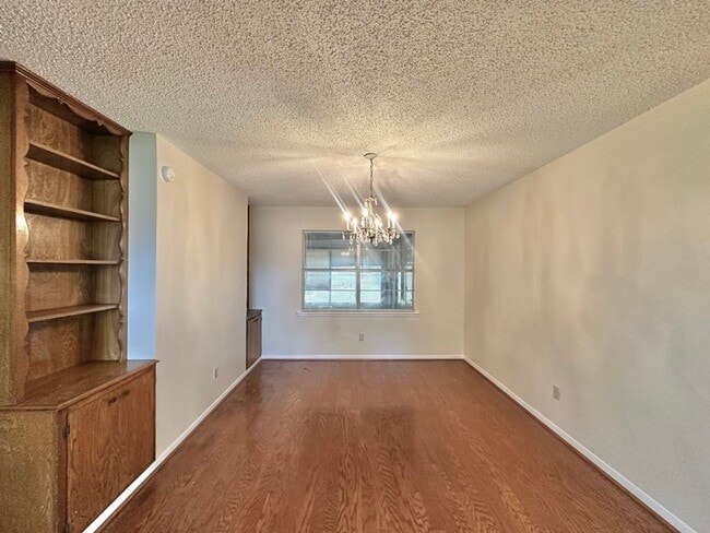 Building Photo - Spacious 4-Bedroom Home on a Corner Lot wi...