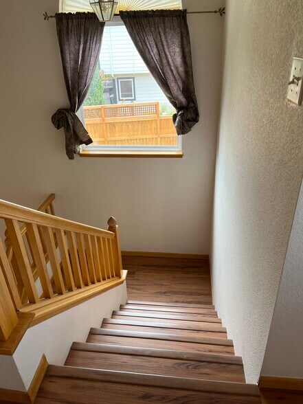 Stairs landing view and window - 2232 Sweetwater Creek Dr