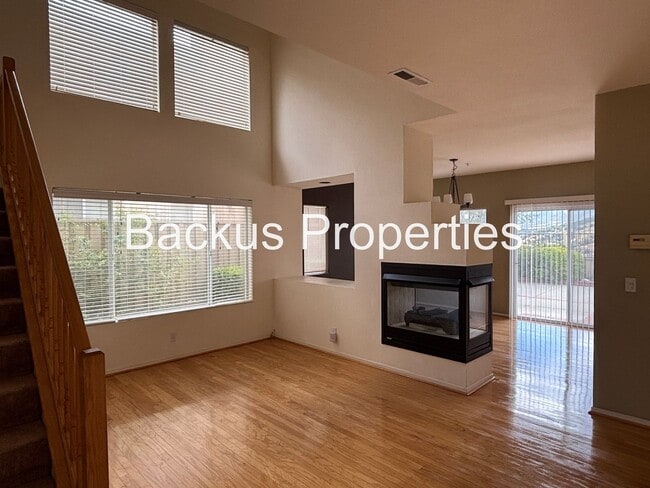 Building Photo - Great two-level home in Las Palmas II with scenic views