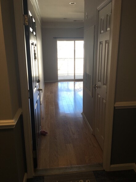 view inside the unit from the outer hallway - 1591 Spring Gate Dr