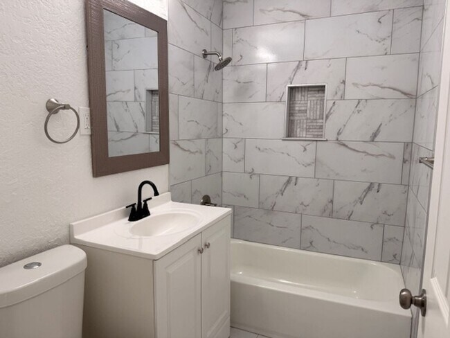 Building Photo - Super cute, fully updated 2 bed / 1 bath with a 1-car garage. Great location close to Fort Sill.