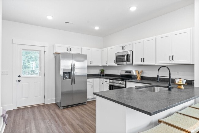 Building Photo - Brand New Construction! End Unit Townhouse...