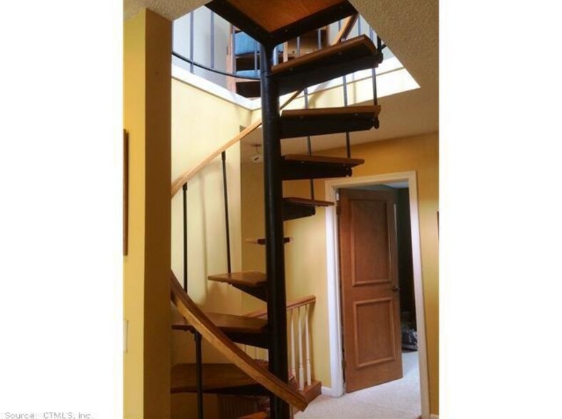 Spiral stairs and primary bedroom entry - 3 Wickhams Fancy