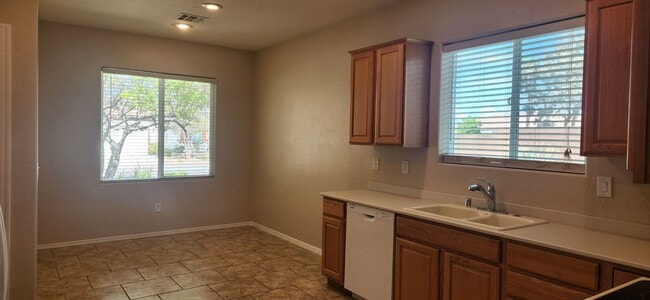 Building Photo - Freshly painted & all new carpeting - 3BR ...