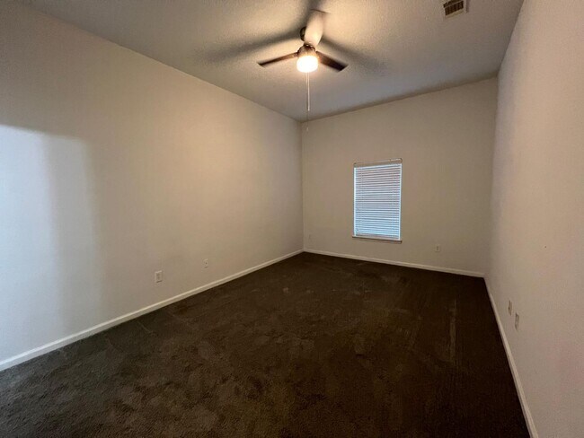 Building Photo - Spacious 3 bedroom condo located in a gated community off of Beach Boulevard