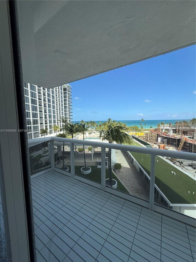 Building Photo - 10275 Collins Ave
