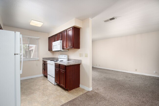 Building Photo - Guard gated SW community with easy Strip a...