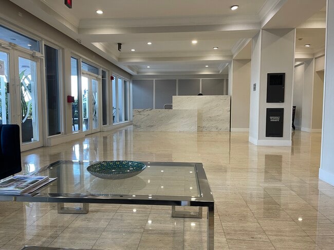 Front desk - 1865 79th Street Cswy