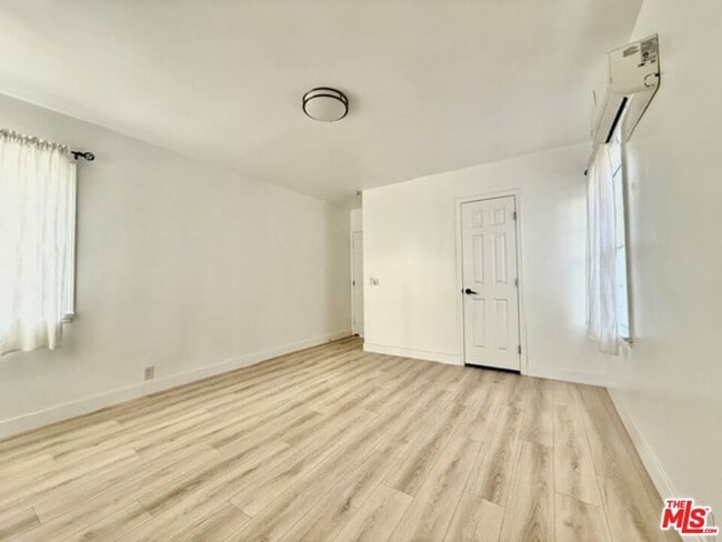 Building Photo - 1219 N Azusa Ave