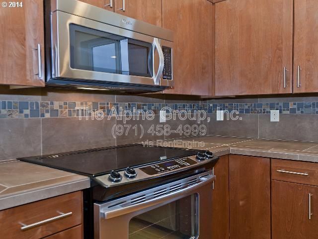 Building Photo - 14323 SW Compass Dr