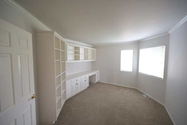 Building Photo - 2 bed + office, 2 bath, 2 car garage condo...