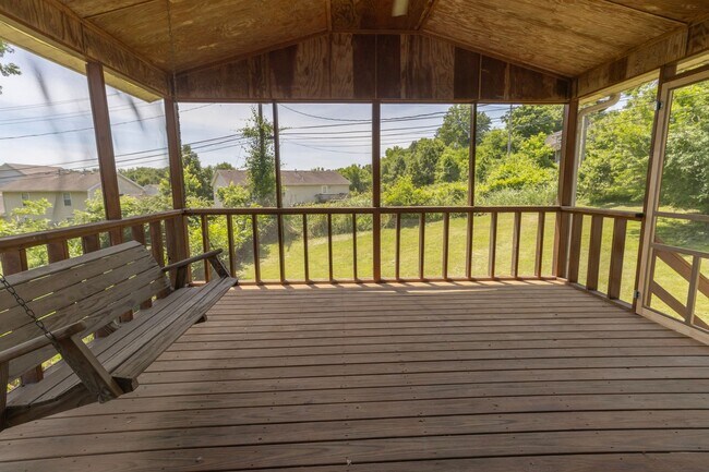 Building Photo - Charming 3BR Home-Screened Porch, Private Garage & Massive Backyard