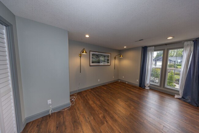 Building Photo - One Level Home - Three Bedroom + Bonus with AC / Beautiful Yard!