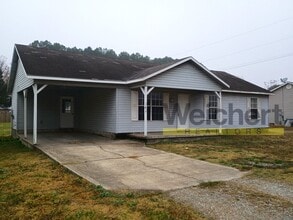 Building Photo - Spacious 3BR/2BA with Carport & Large Yard