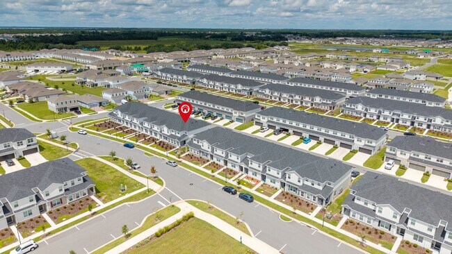 Building Photo - 3BR Center Lake Townhome | 2-Car Garage, Loft & Resort-Style Amenities