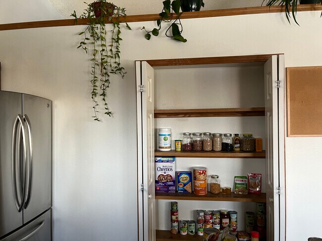 Pantry in 3/4 wall between kitchen and front room - 2619 15th Ave
