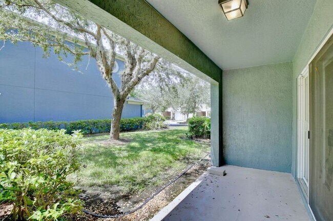 Building Photo - Beautiful 2/2.5 Cozy Townhome with a 1 Car Garage in the Gated Community of Victoria Pines - Orlando