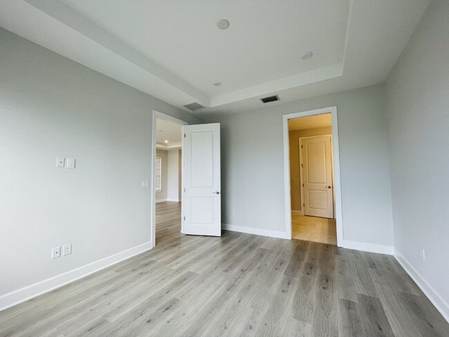 Building Photo - Gated Community 3 Bedroom with Den Villa A...