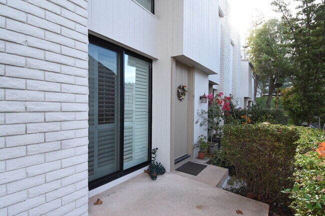 Front door & Living Room slider. - 3610 W Estates Ln