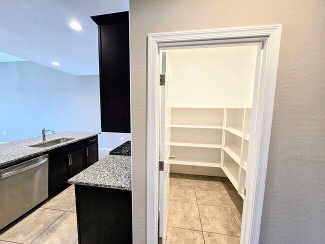 Building Photo - 4 Bedroom Home in Tartesso, a Master Planned Community