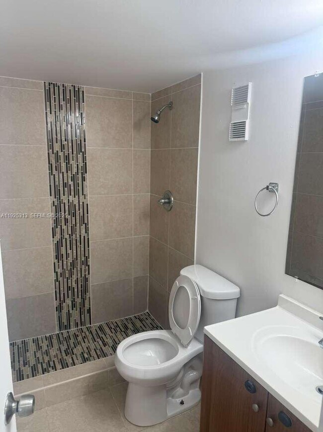 Building Photo - 8700 N Sherman Cir