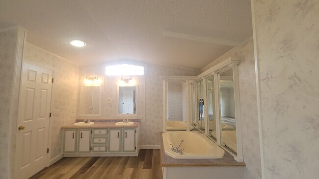 Building Photo - " 2-Bed, 2-Bath Mobile Home Retreat in Tan...