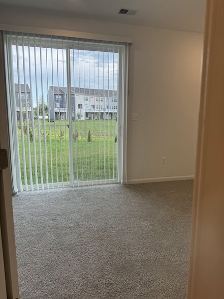 full bedroom at entrance - 509 Rosemary Cir