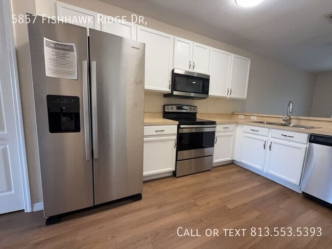 Building Photo - 5857 Fishhawk Ridge Dr