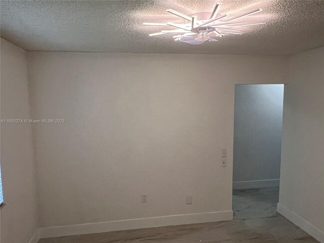 Building Photo - 9501 E Calusa Club Dr