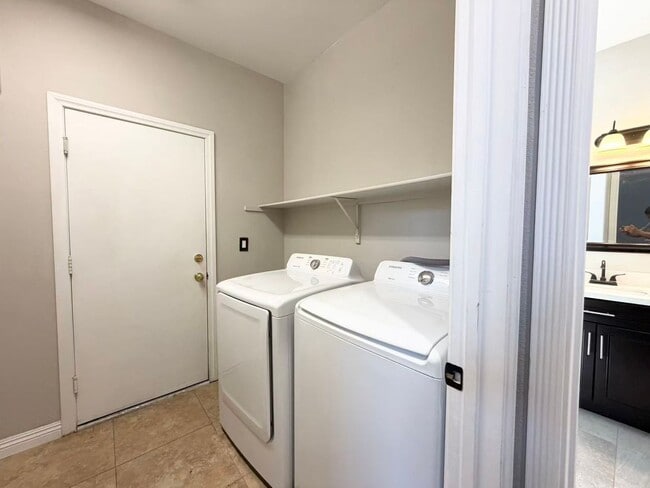 Building Photo - Wonderful corner lot home features 4 bedrooms and 3 full bathrooms