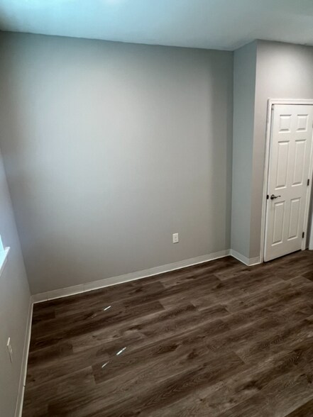 Building Photo - 7038 Woodland Ave