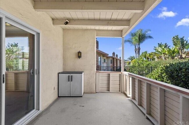 Building Photo - Poolside Living at Its Finest – Turnkey 3BR Condo with Direct Patio Access to the Pool