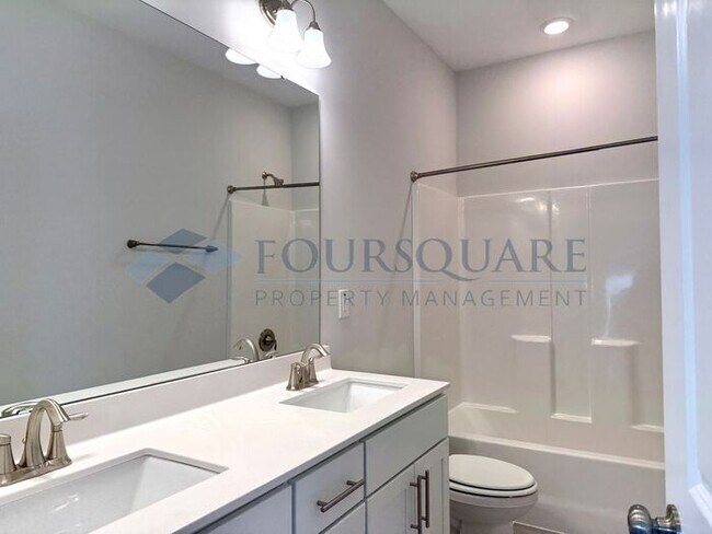 Building Photo - Spacious Corner-Lot Home with Guest Suite, Screened Porch & Detached 2-Car Garage – Resort-Style ...
