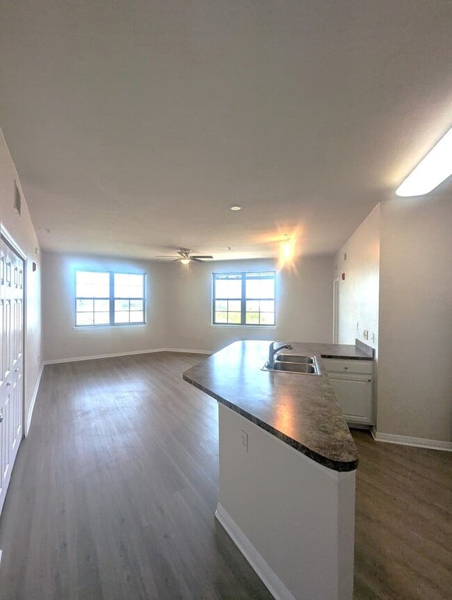 Building Photo - 2x2 New flooring throughout! Updated, spacious, comfortable with balconette!
