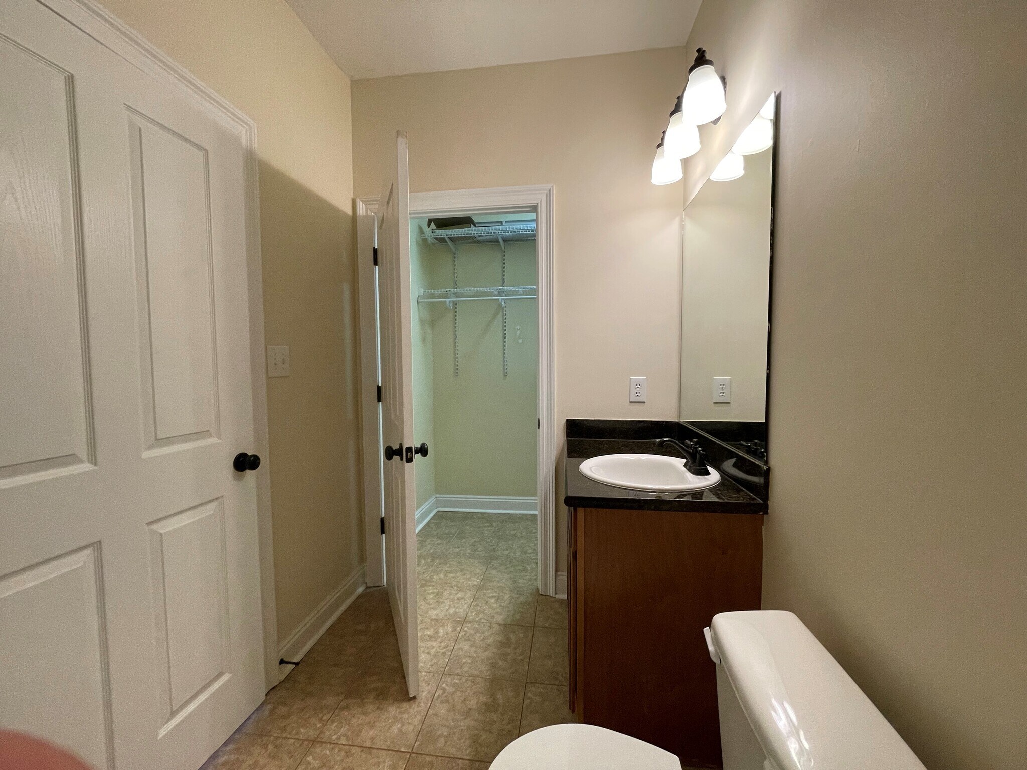 primary bath and closet - 20637 Blueberry Ln