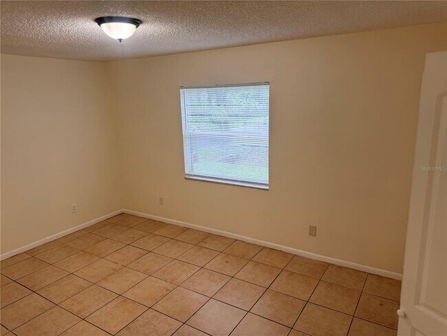 Building Photo - 9406 N Hartts Dr