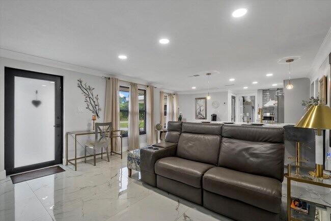 Building Photo - 3-Bedroom Punta Gorda Retreat with Marble Finishes & Stylish Furnishings!"